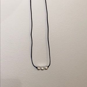 Three pearl necklace